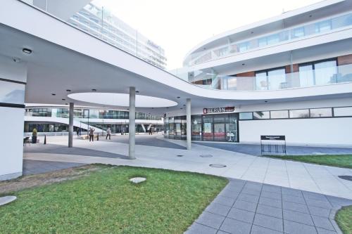 an external view of a building with a courtyard at Baltic Park Molo by Baltic Home in Świnoujście