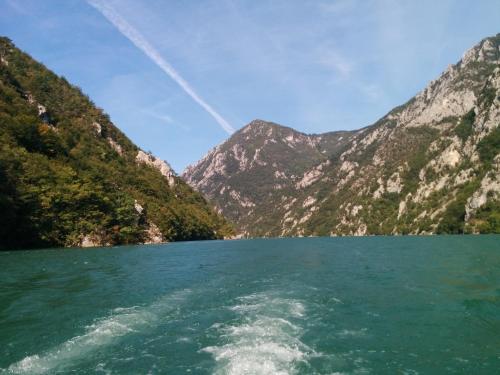 a view from a boat in a mountain lake at Mala bašta in Bajina Bašta