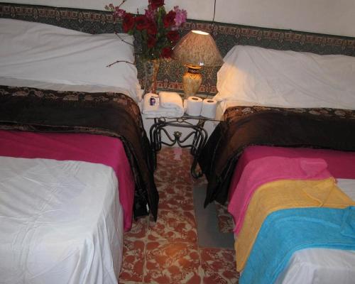 Cama o camas de una habitación en Bachelor Inn Hotel