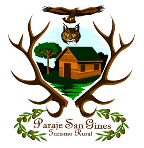 a logo of a house with an owl and a tree at Apartamentos Paraje San Gines in Andújar