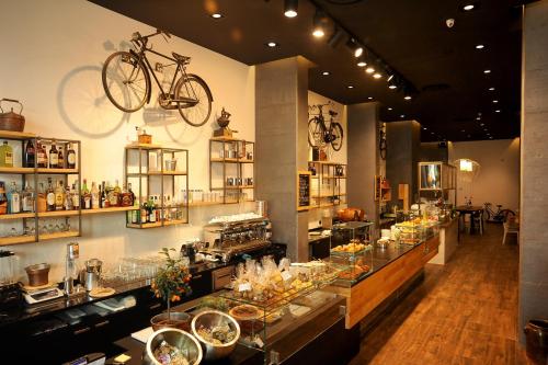 a restaurant with a bike hanging on the wall at Hotel Rivarolo in Rivarolo Canavese