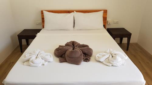 Ліжко або ліжка в номері Positano Alona Beach Panglao