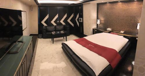 מיטה או מיטות בחדר ב-Prime Hotel Fulula プライムホテル フルーラ
