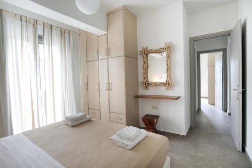 Posteľ alebo postele v izbe v ubytovaní Sweet Home Naxos