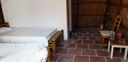Katil atau katil-katil dalam bilik di Chau Doc Homestay