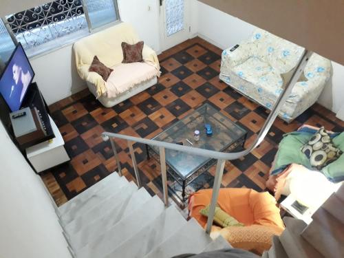 an overhead view of a living room with a couch and a tv at Great Moments Copacabana in Rio de Janeiro