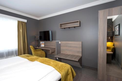 Katil atau katil-katil dalam bilik di Dr. Holms Hotel