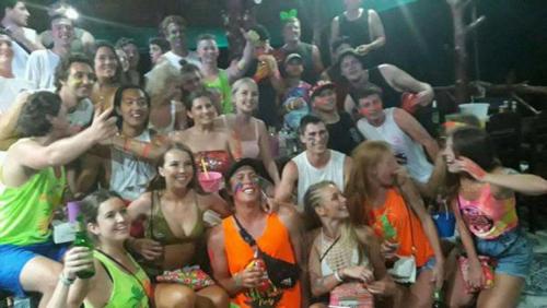 a group of people in swimsuits posing for a picture at Venus Resort in Haad Rin