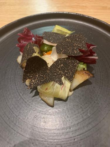 a plate of food with a star on it at South Lodge in Lower Beeding