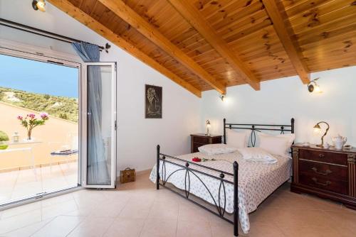 Tempat tidur dalam kamar di Villa Bella Sole