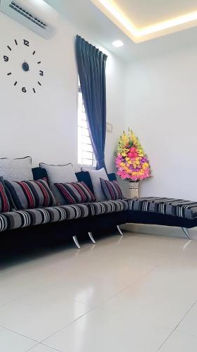 Χώρος καθιστικού στο Home2u Alor Setar Homestay