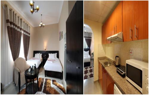 Al Smou Hotel Apartments - MAHA HOSPITALITY GROUP في عجمان: غرفة فندقية بسريرين ومطبخ