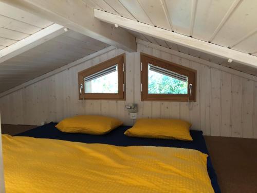 Postel nebo postele na pokoji v ubytování Rifugio Nel Bosco