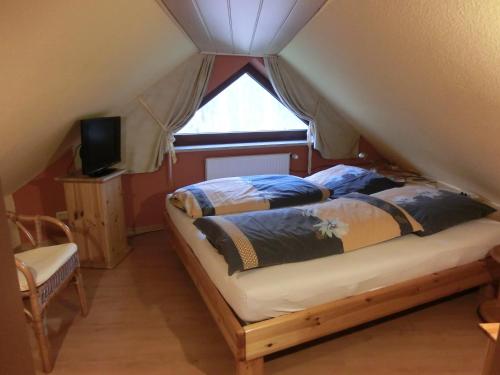 Postel nebo postele na pokoji v ubytování Ullas Gästehaus