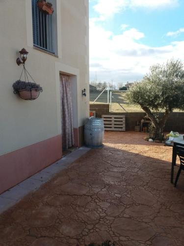 a courtyard of a house with a patio at El Balcón de la Mata in Mata de Quintanar