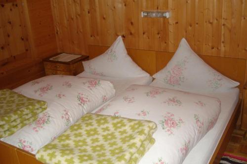 Кровать или кровати в номере Ausserwalderhof