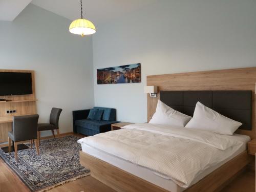 Katil atau katil-katil dalam bilik di Hotel-Restaurant Pfeffermühle Balingen