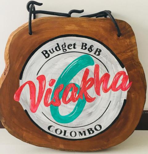 a sign for a vita colombo restaurant at Visakha 6 in Colombo