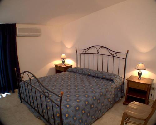 Кровать или кровати в номере Residence Gnura Momma