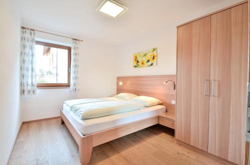 Postel nebo postele na pokoji v ubytování Pizzol-hof
