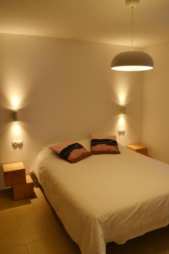Llit o llits en una habitació de ura