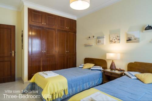 A bed or beds in a room at Akivillas Lagos Garden