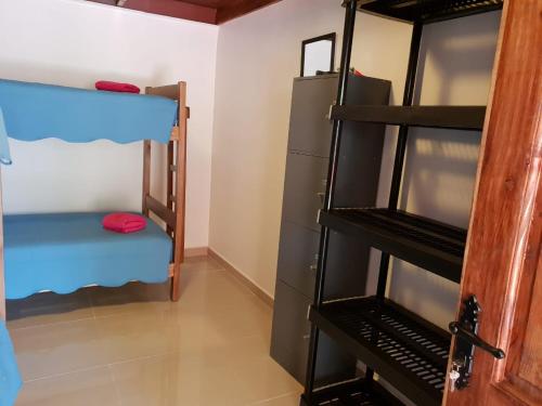 Una cama o camas en una habitación de Anka Hostel