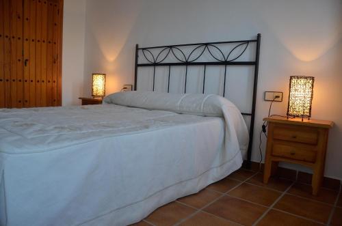 Postel nebo postele na pokoji v ubytování APARTAMENTO EL CAPRICHO DE AGUAMARGA