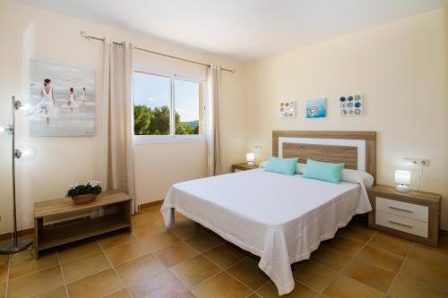 Postel nebo postele na pokoji v ubytování Villa del Mar