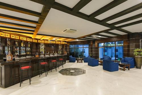 The lounge or bar area at Ramada Khajuraho