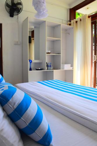 Cama o camas de una habitación en Ocean Caves, Balapitiya