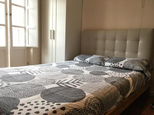 Postel nebo postele na pokoji v ubytování Vidrio Apartment