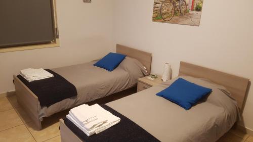 Katil atau katil-katil dalam bilik di Etna Parking