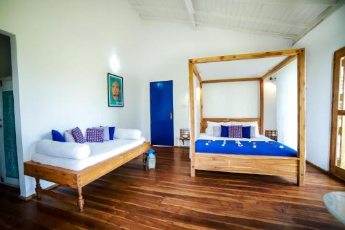 Postel nebo postele na pokoji v ubytování Amanta Beach