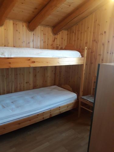 Postel nebo postele na pokoji v ubytování Agriturismo I Conti Di Piscè