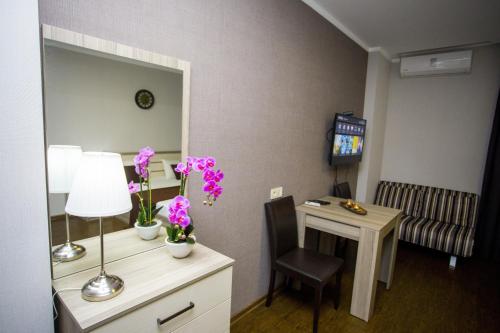 Телевизор и/или развлекательный центр в Lux Apartment