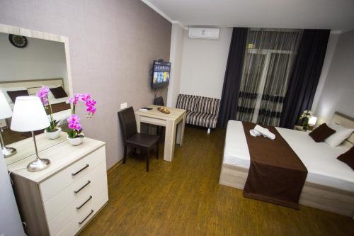 Кровать или кровати в номере Lux Apartment