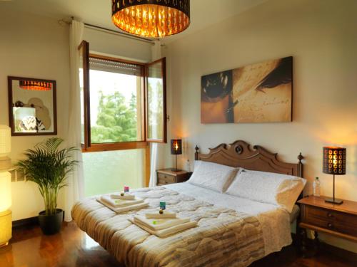 Postel nebo postele na pokoji v ubytování Residenza Bellaria Park "Hills View"