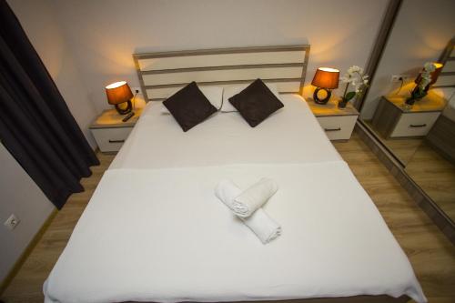 Кровать или кровати в номере Lux Apartment