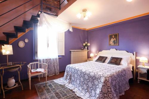 Un pat sau paturi într-o cameră la Appartamento Valle Verde