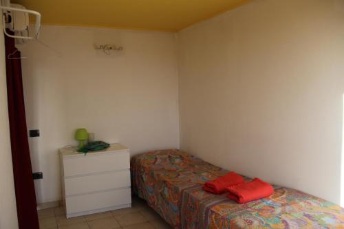 A bed or beds in a room at Scirocco dal Mare