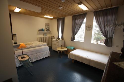 Säng eller sängar i ett rum på Dalvík Hostel Gimli