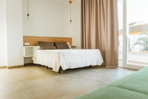 Cama o camas de una habitación en Apartamentos ZHR
