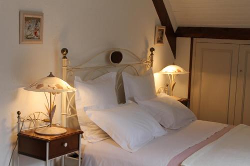 Кровать или кровати в номере Chambres d'hôtes La Brillève