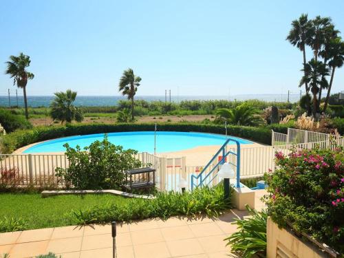 Bazen v nastanitvi oz. blizu nastanitve Antibes T2 Vue mer 48m2 Terrasse Parking Piscine Plage