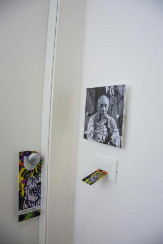 a black and white photo of a man on a refrigerator at B&b '900 in Foggia