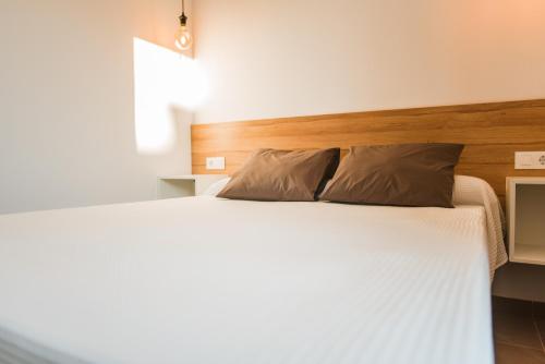 Cama o camas de una habitación en Apartamentos ZHR