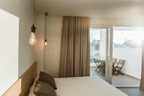 Cama o camas de una habitación en Apartamentos ZHR