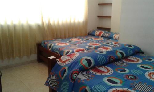 Postel nebo postele na pokoji v ubytování Hotel Real Pólux