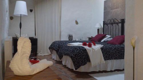 Katil atau katil-katil dalam bilik di Finca Los Ciruelos Casas Rurales